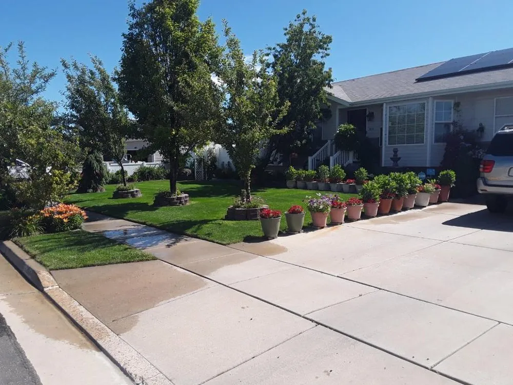 Custom landscape installation with custom design across Roy, UT - Willie’s Lawn Service
