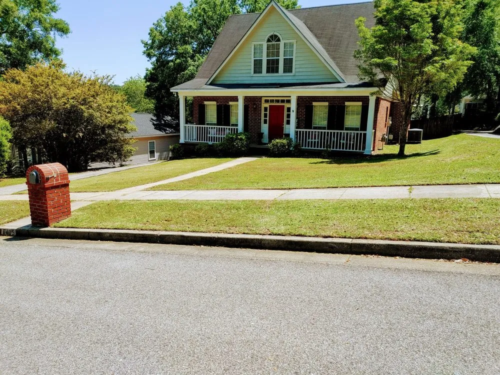 Custom lawn mowing service for year-round maintenance in Mobile, AL by Willing 2 Work