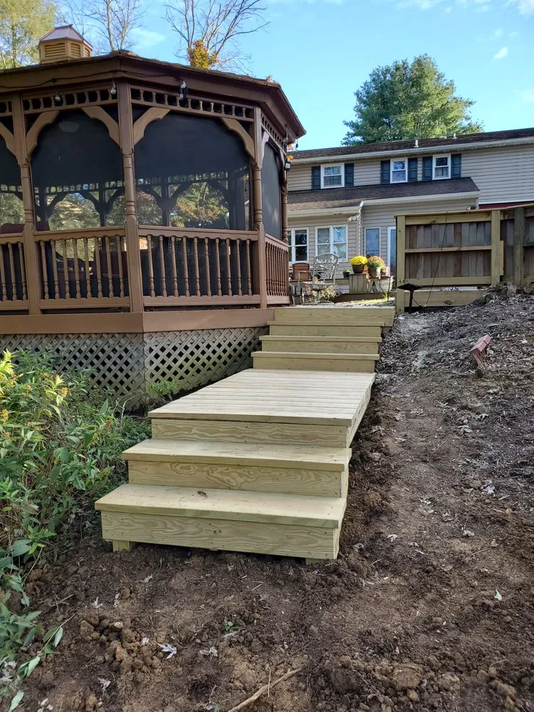 Professional landscaping services for homes in Ronks, PA by Willing Hands Enterprise