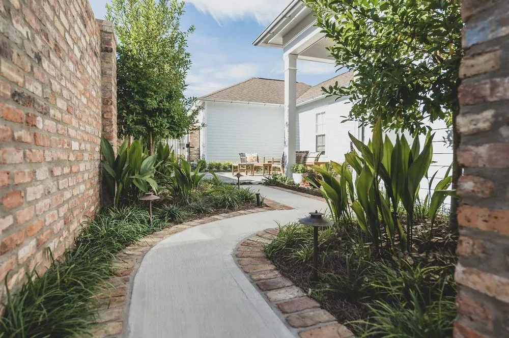 Professional yard maintenance for residential properties in Mandeville, LA by WillowGrove Landscape