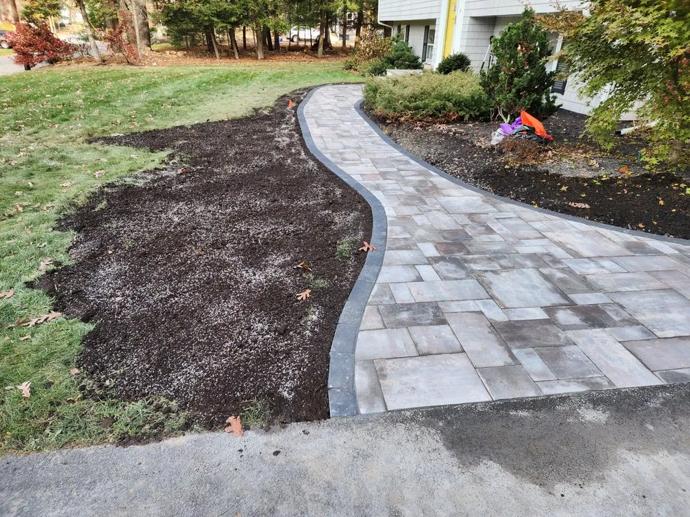 Reliable lawn mowing service experts serving Hanson, MA - Wilson Bobcat & Masonry