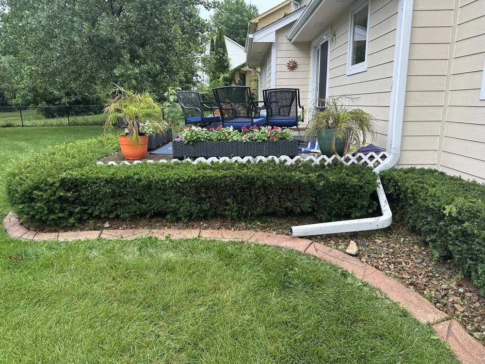 Custom lawn mowing service for year-round maintenance in Johnston, IA by Wilson’s Hedge & Bush Trimming
