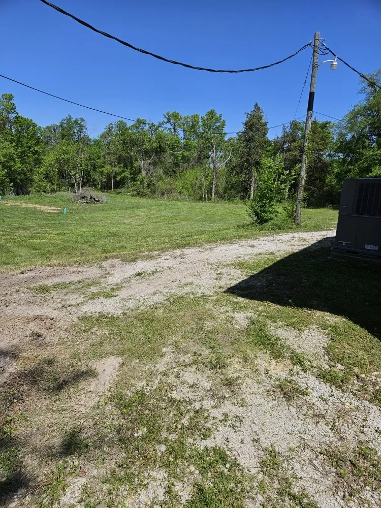 Affordable residential landscaping in Pittsburg, TX by Windwalker Lawn Services