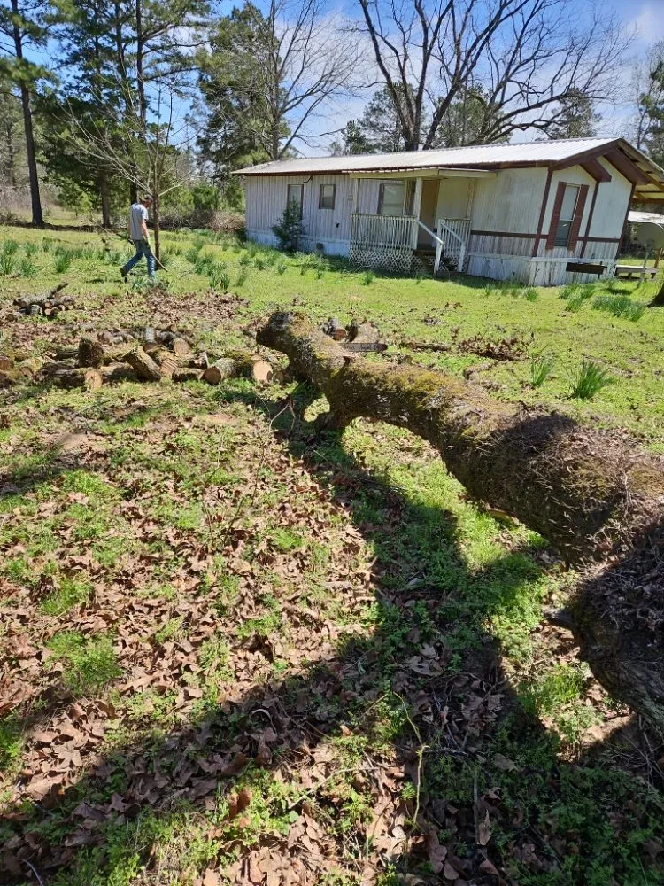 Custom outdoor landscaping in Pittsburg, TX by Windwalker Lawn Services