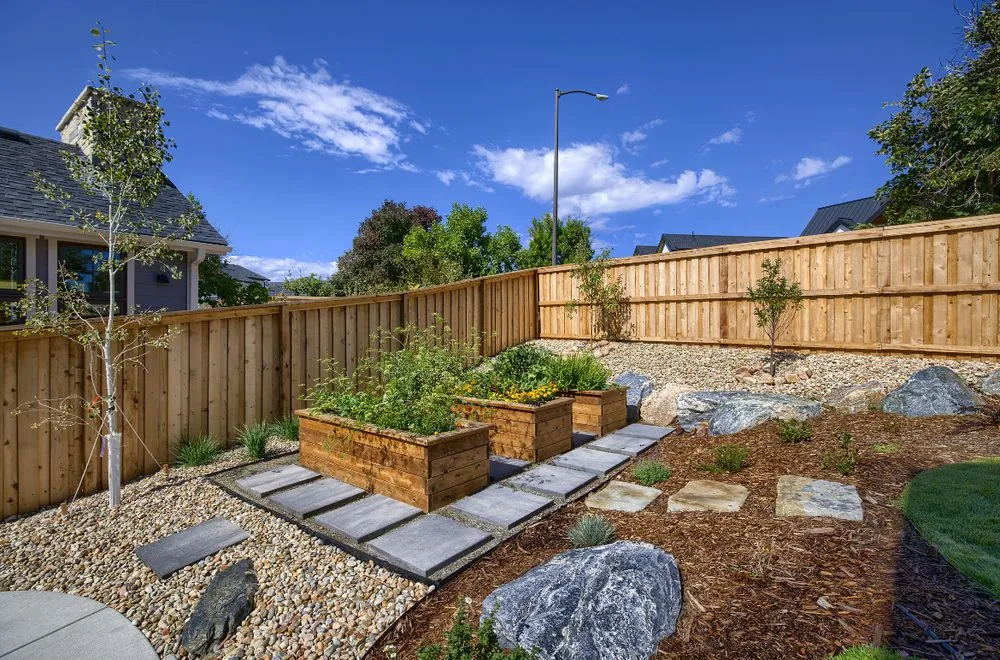 Expert lawn care service for year-round maintenance in Louisville, CO by Windwood Spaces