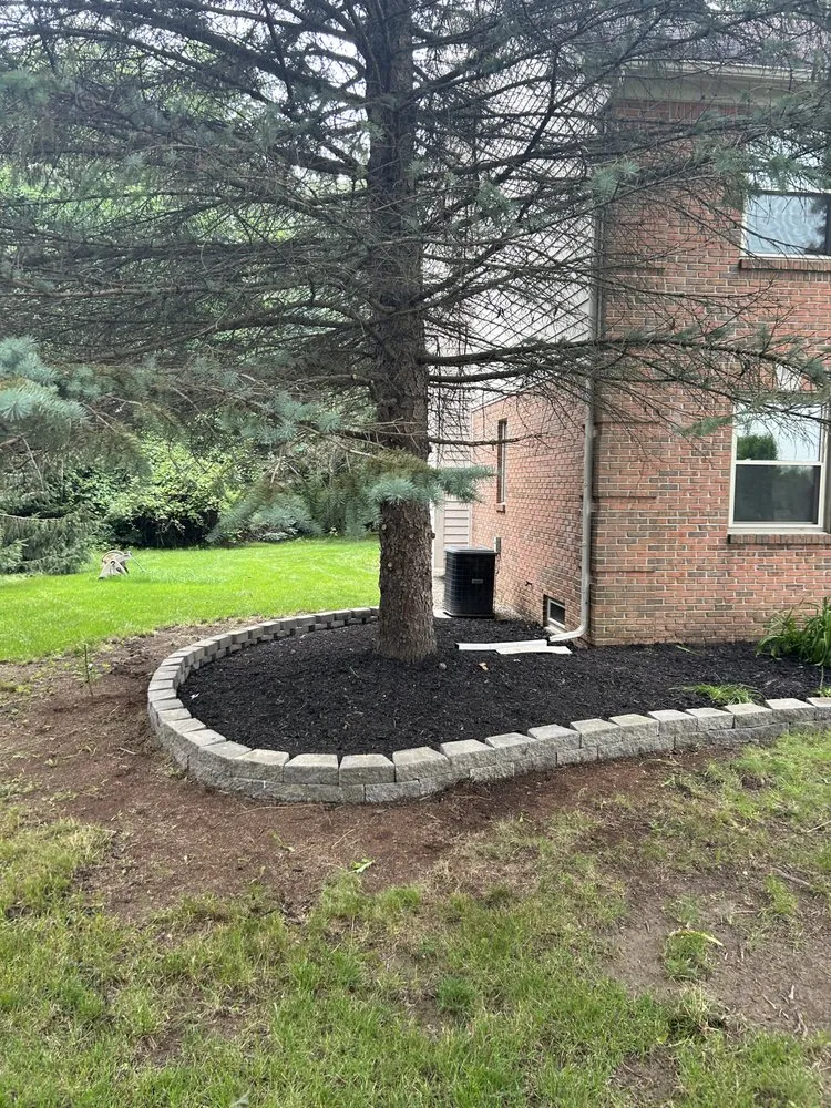Custom outdoor landscaping for homes in Milford, MI by Wings Lawncare