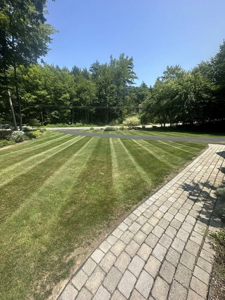 Affordable landscaping services for beautiful yards in Wolfeboro, NH by Winni Property Services