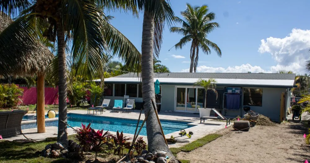 Expert lawn mowing service for residential properties in Palm Bay, FL by WinTech