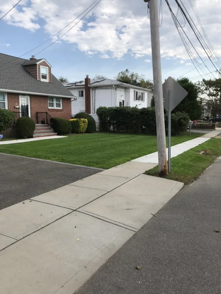 Affordable lawn mowing service for residential properties across Massapequa, NY - Winter Gardens Landscaping