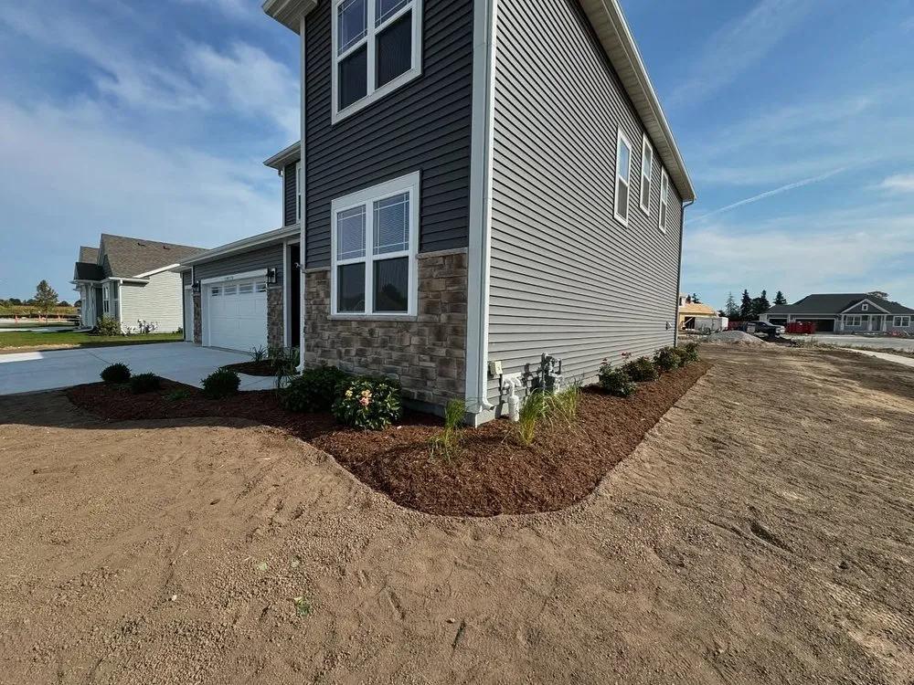 Professional landscape design for year-round maintenance across West Bend, WI - Wintergreen Site Management