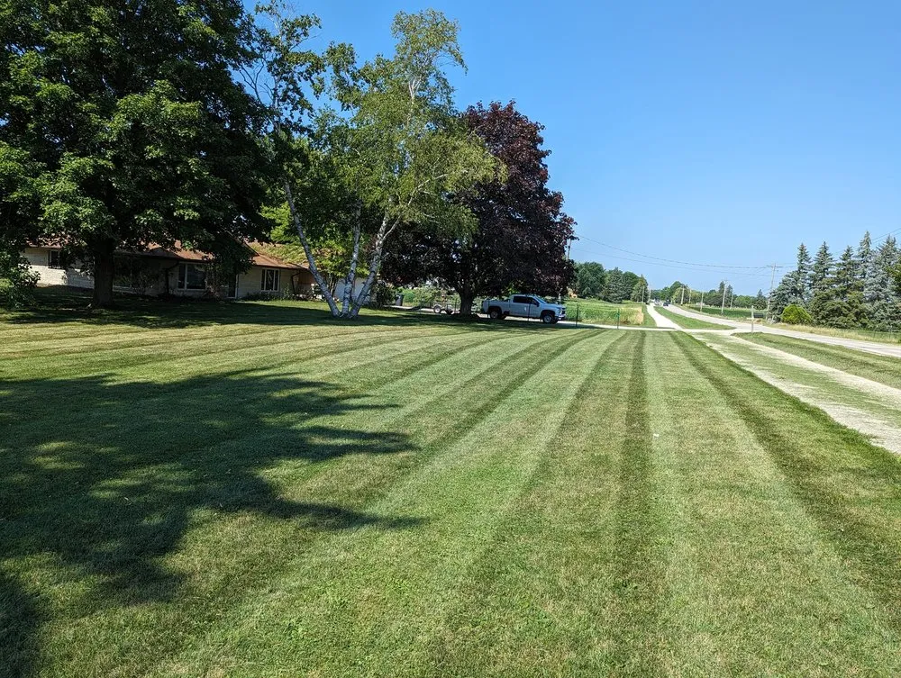 Professional lawn mowing service for residential properties across Bayside, WI - Wisconsin Lawn and Snow