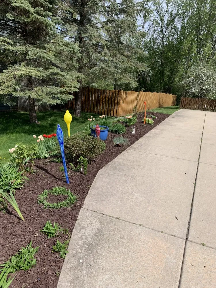 Professional lawn mowing service in Menomonee Falls, WI by Wisconsin Roots