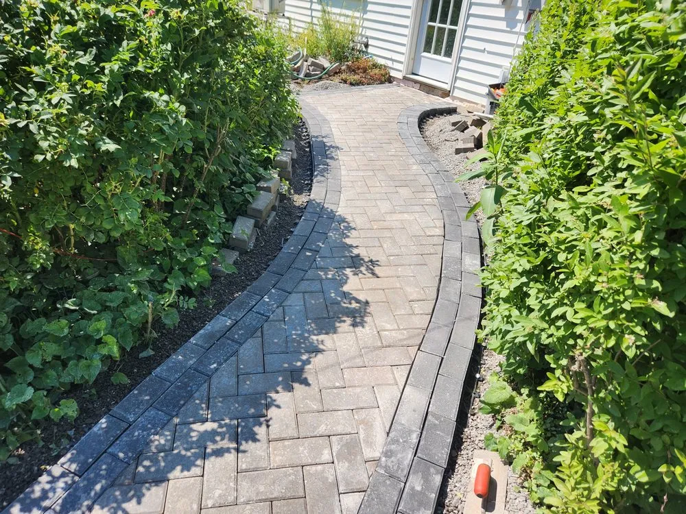 Expert outdoor landscaping for residential properties in West Gardiner, ME by Wisdom Landscape
