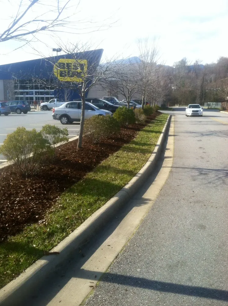 Professional garden landscaping with custom design in Candler, NC by Wise Choice Lawn Care & Landscaping