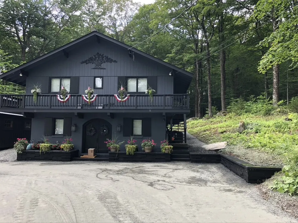 Local lawn mowing service for year-round maintenance in South Londonderry, VT by Wise Oak