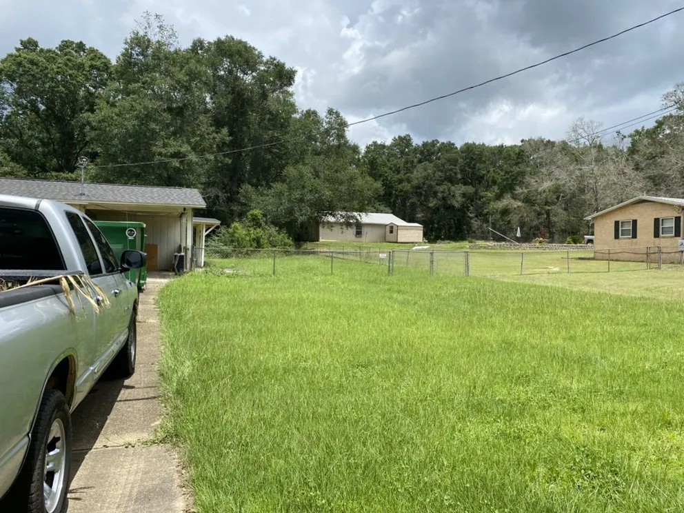 Reliable landscape design for homes in Pace, FL by Wisemen Tree Company