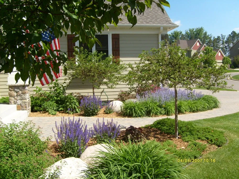 Custom lawn mowing service for year-round maintenance in Elk River, MN by Wizard Lawn Service and Snow Plowing, LLC