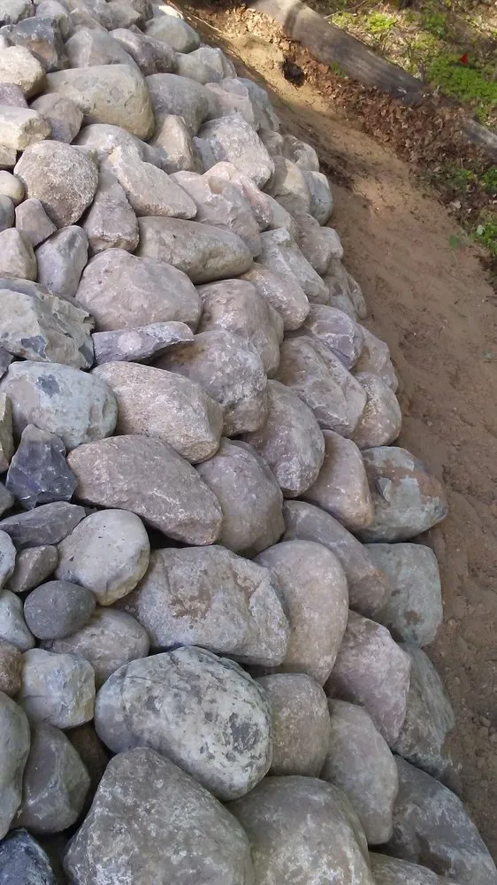 Custom yard cleanup service for homes across Kalkaska, MI - W&K landscaping