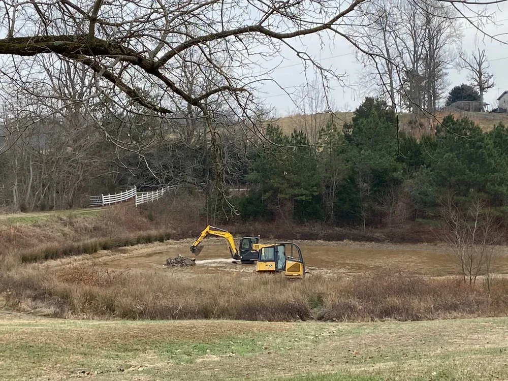 Affordable lawn mowing service with custom design in Dickson, TN by WM Tucker Excavating & Landscaping