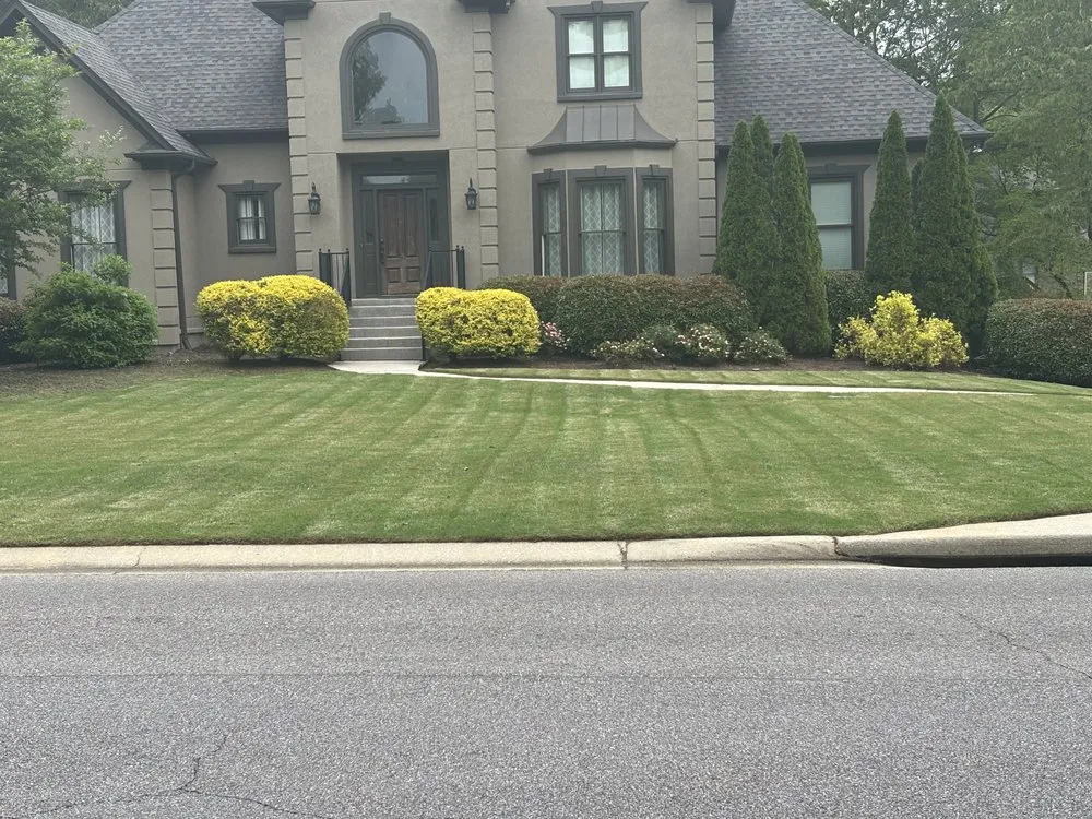 Expert landscape installation for residential properties in Birmingham, AL by Woe Family Services