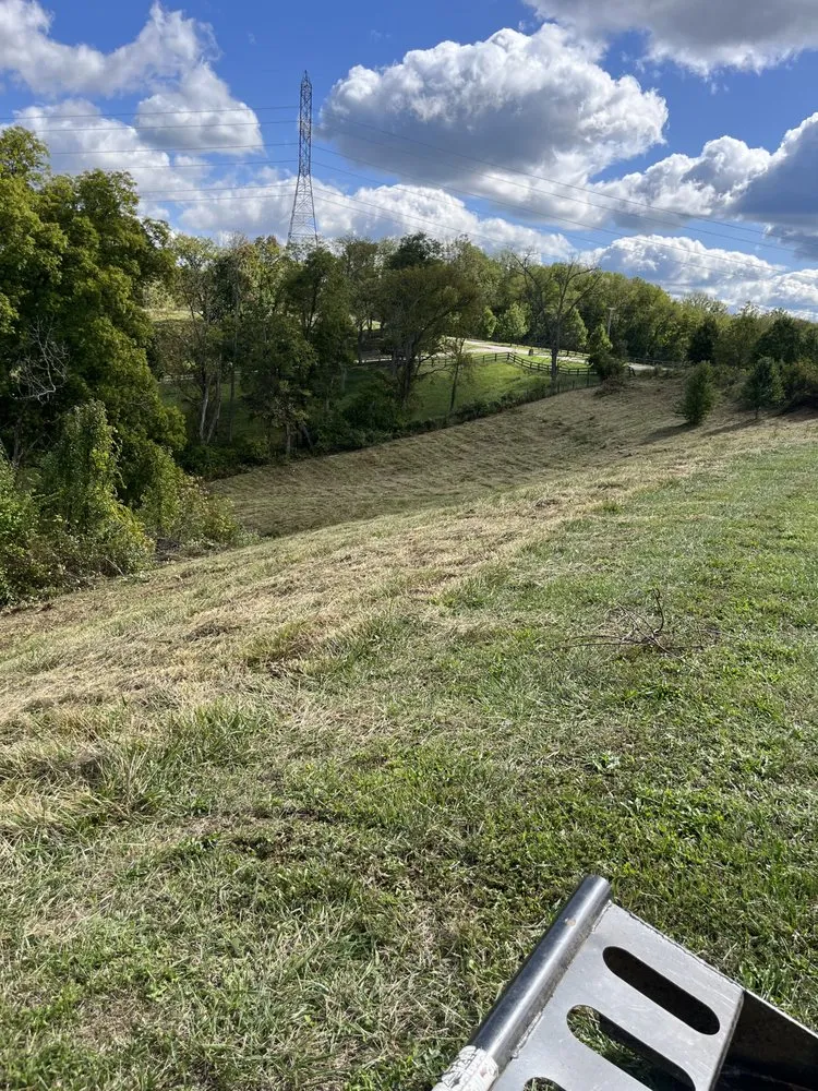 Expert lawn mowing service with custom design in Burlington, KY by Wolfe's landscape construction