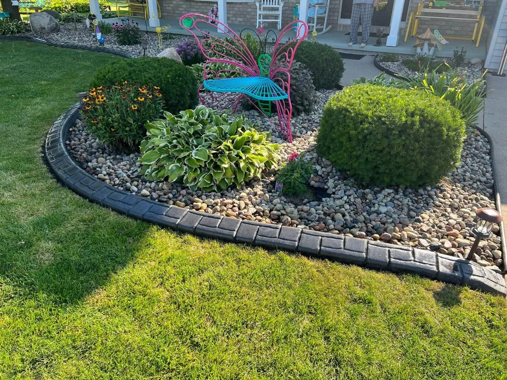 Custom lawn mowing service for homes in Hortonville, WI by Wolfrath's Curb