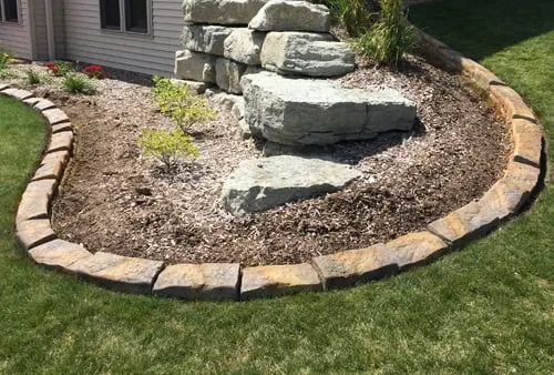 Top-rated residential landscaping for year-round maintenance in Hortonville, WI by Wolfrath's Curb