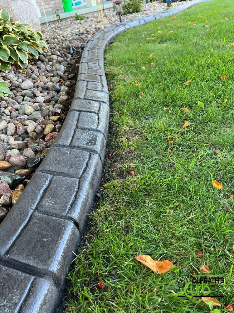 Trusted landscape design for homes across Hortonville, WI - Wolfrath's Curb