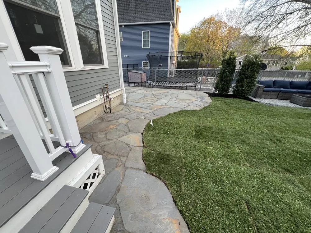 Local yard cleanup service in Belmont, MA by Wollaston Development