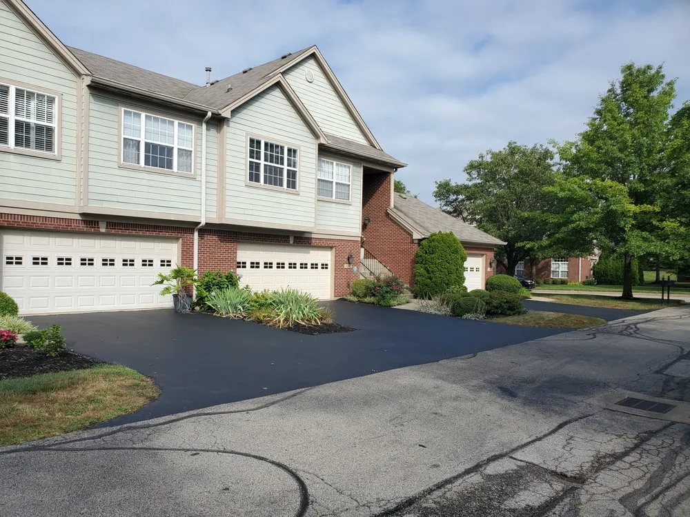 Expert lawn mowing service for year-round maintenance in Lawrenceburg, KY by Wolverton Sealcoating