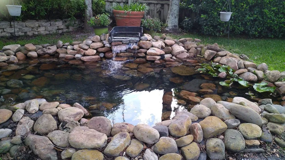 Custom landscape design for beautiful yards in Winter Park, FL by Wonders of Water