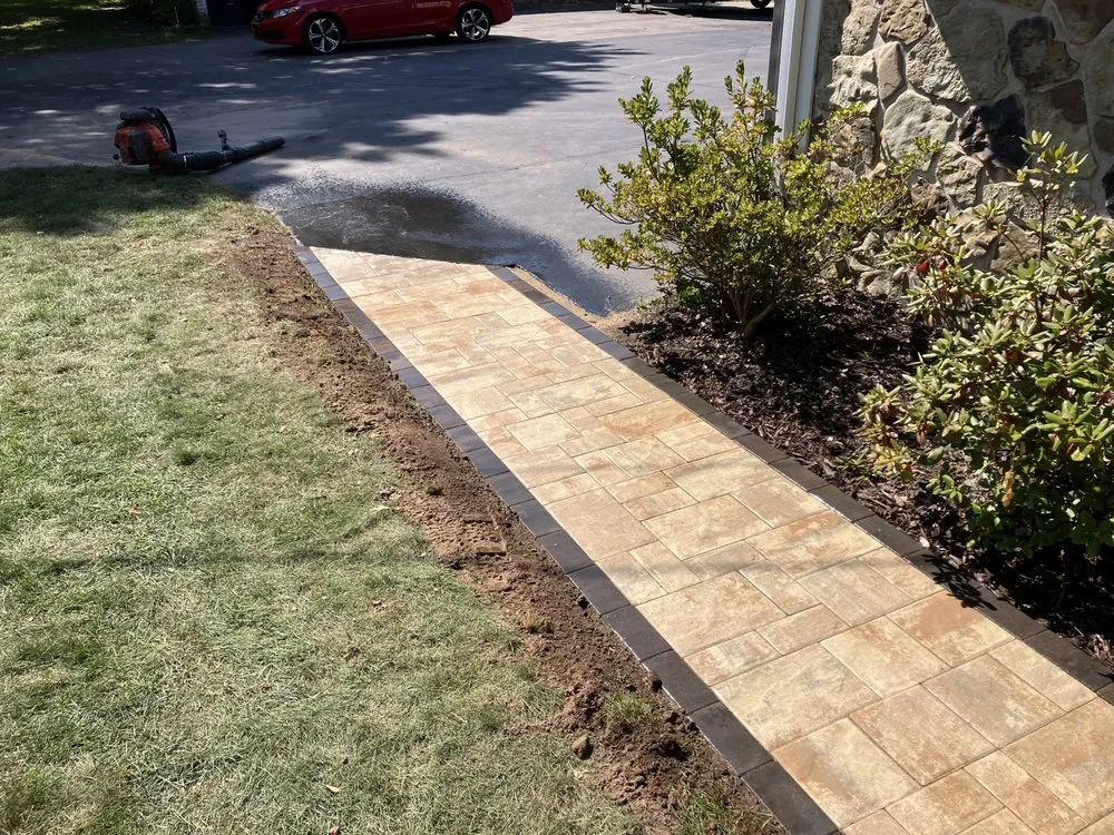 Professional landscape design for homes in Walworth, NY by Woodgreen Landscape And Construction