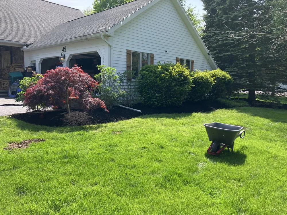 Top-rated landscape installation with custom design in Walworth, NY by Woodgreen Landscape And Construction