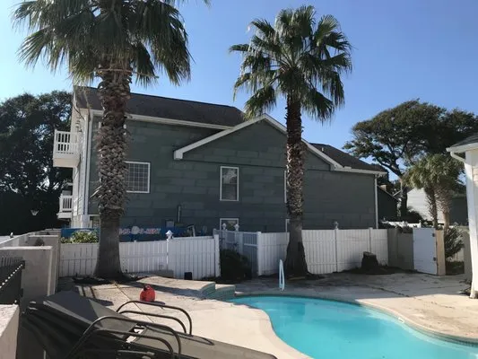 Woodlark Lawn & Maintenance Logo