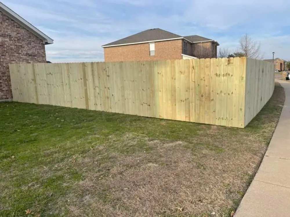 Top-rated lawn care service for residential properties across Dallas, TX - Woodpecker Fence and Landscape