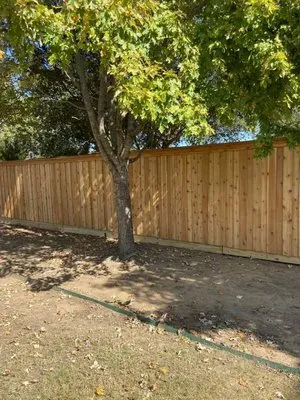 Woodpecker Fence and Landscape Logo