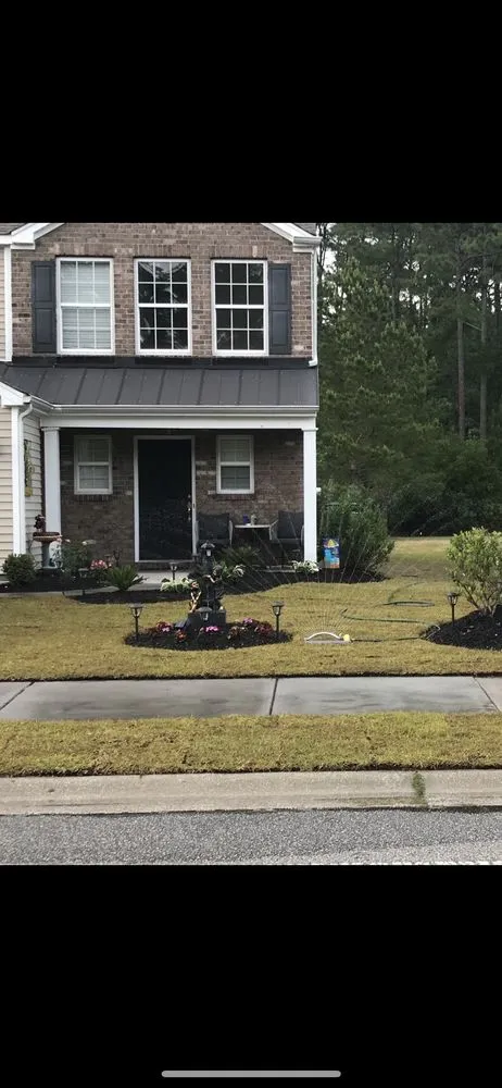 Custom landscape installation experts serving Liberty, NC - woods cutting edge