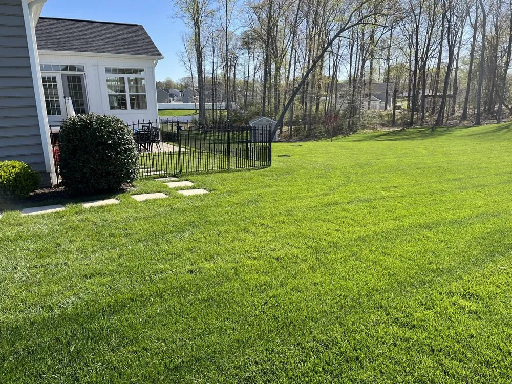 Custom landscape installation for homes in Prince Frederick, MD by Woods Lawn Care And Firewood
