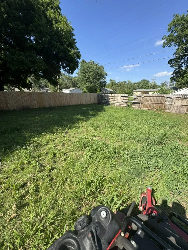 Professional yard maintenance for beautiful yards in Wichita, KS by Woods Lawn Care