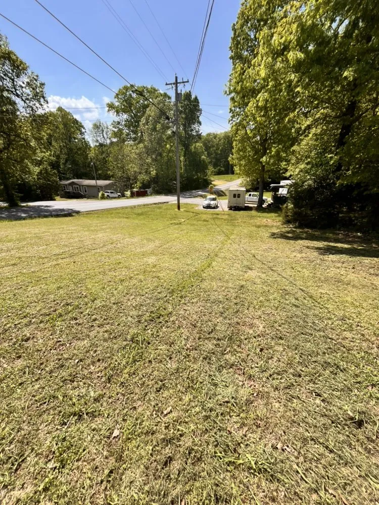 Affordable lawn care service for year-round maintenance across Newport, TN - Woods&Son property management