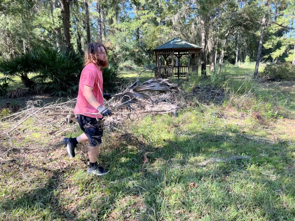 Reliable yard cleanup service for year-round maintenance in Jacksonville, FL by Woodswork Maintenance