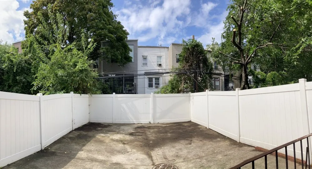 Custom outdoor landscaping in Brooklyn, NY by Woody Woodpecker Tree Service