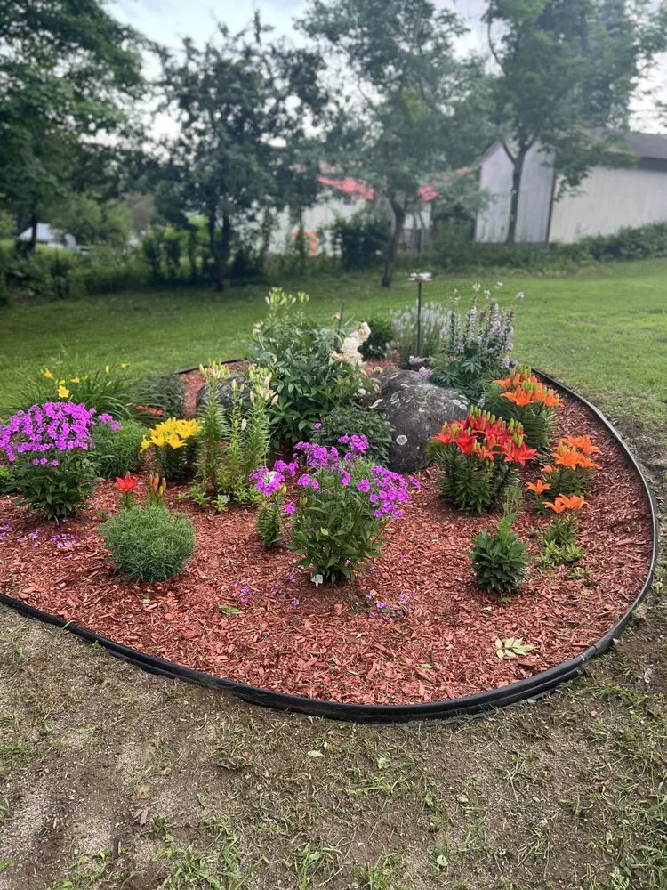 Custom garden landscaping for year-round maintenance across Sunapee, NH - Woody's Landscaping