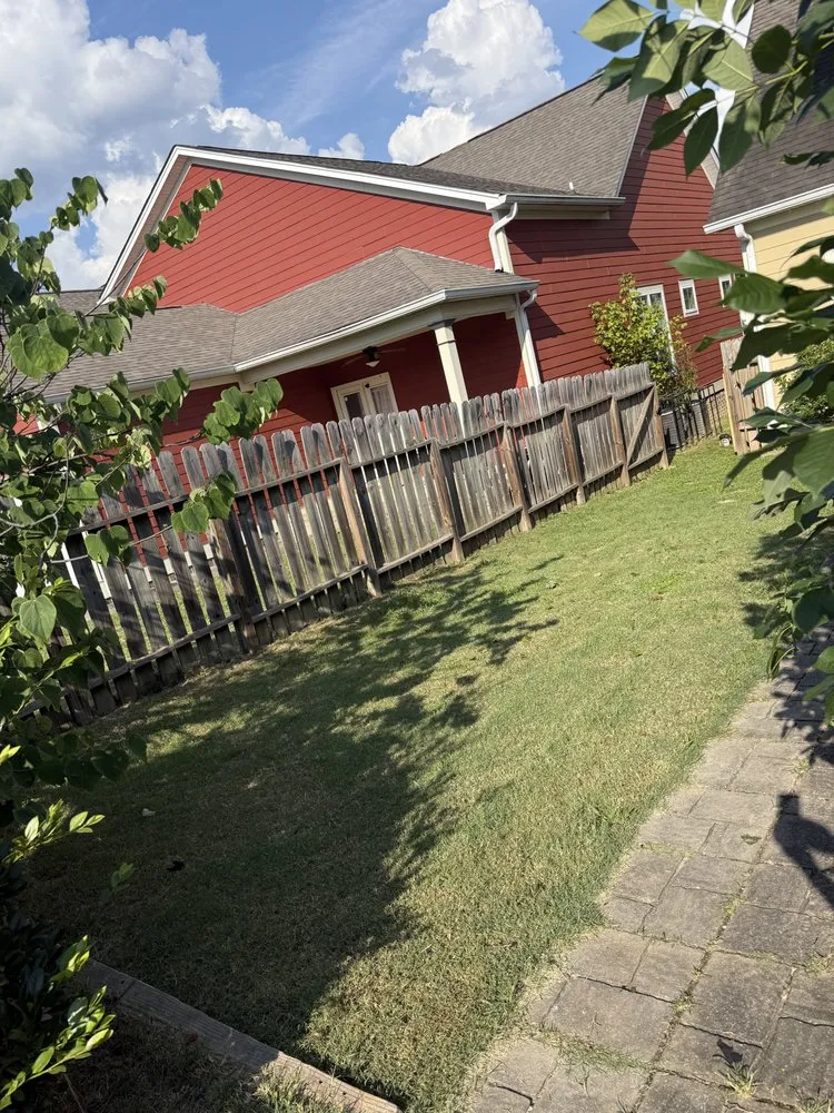 Custom landscape installation with custom design in Cleveland, TN by Woodys Property Clean Outs