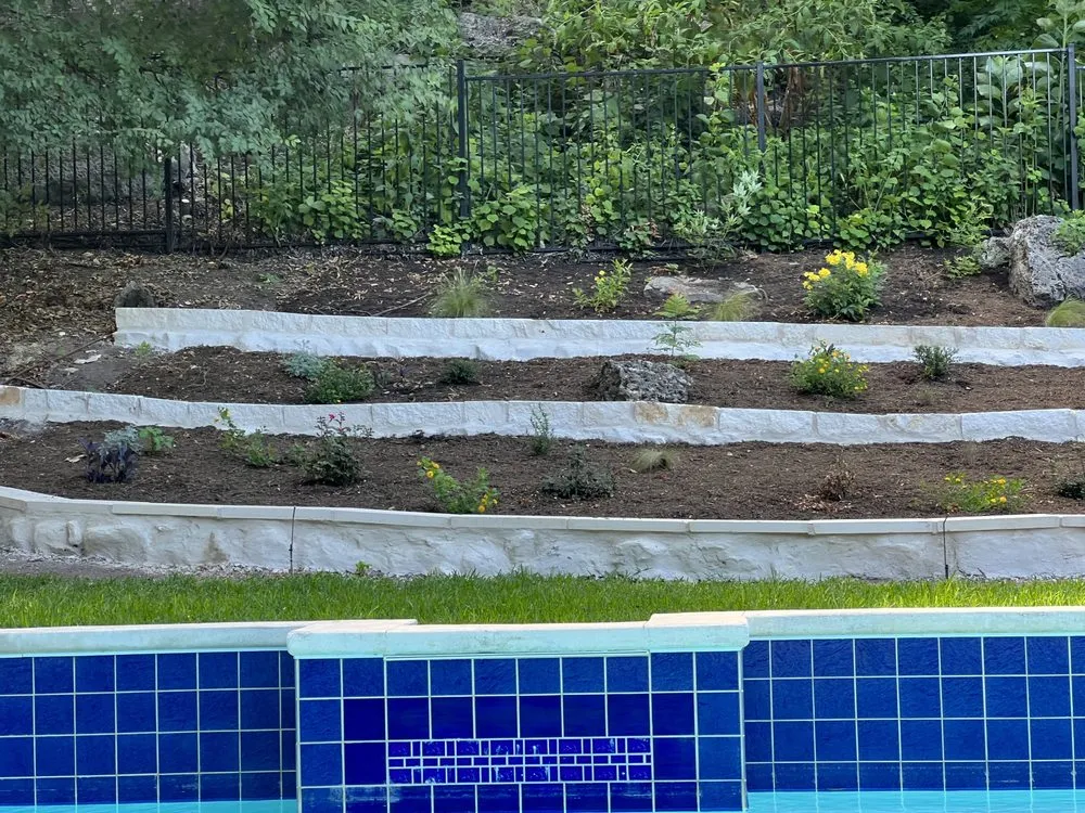 Professional residential landscaping for beautiful yards in Austin, TX by Woody's Tree Service & Landscape