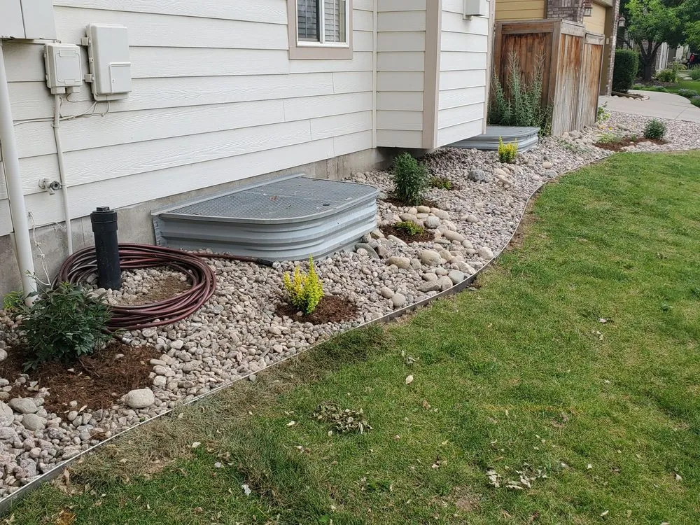 Expert lawn mowing service with custom design in Fort Collins, CO by Word of Mouth Landscaping