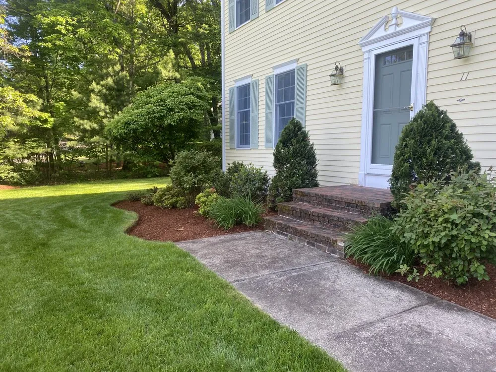 Expert lawn mowing service in Framingham, MA by World Land Design