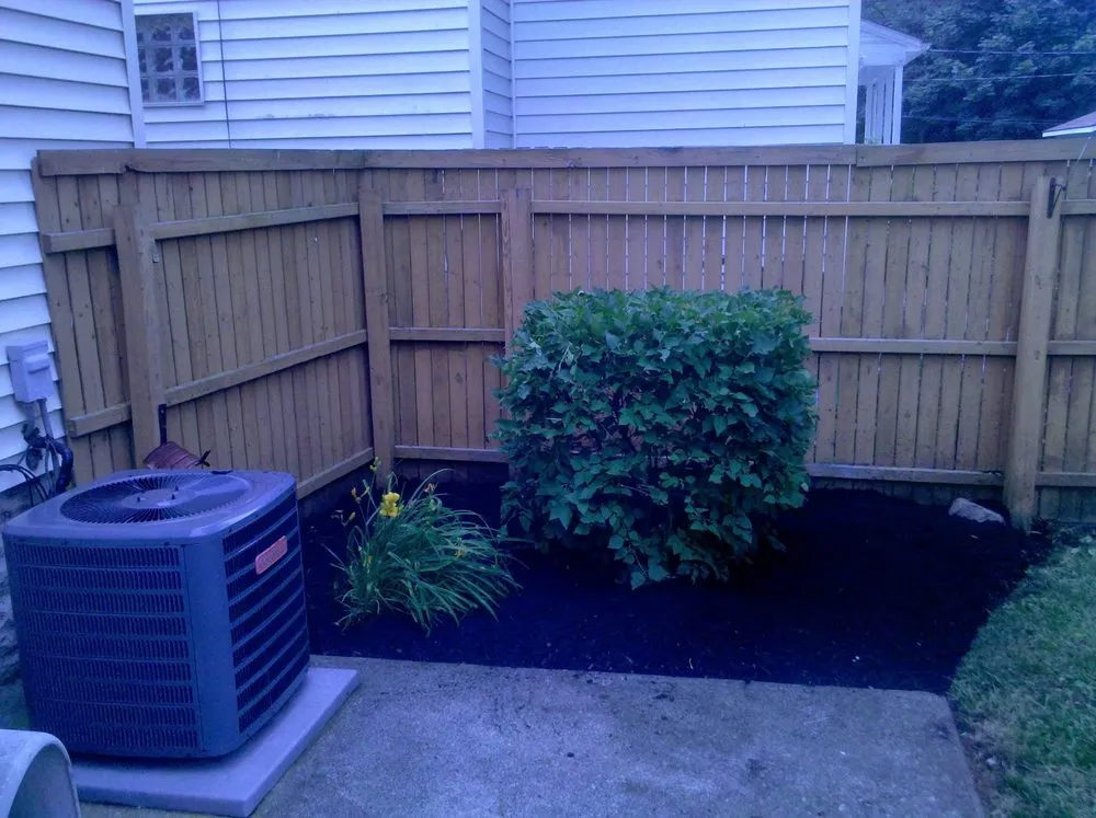 Professional landscape installation for beautiful yards in Columbus, OH by Worldwide Dust Bunni's