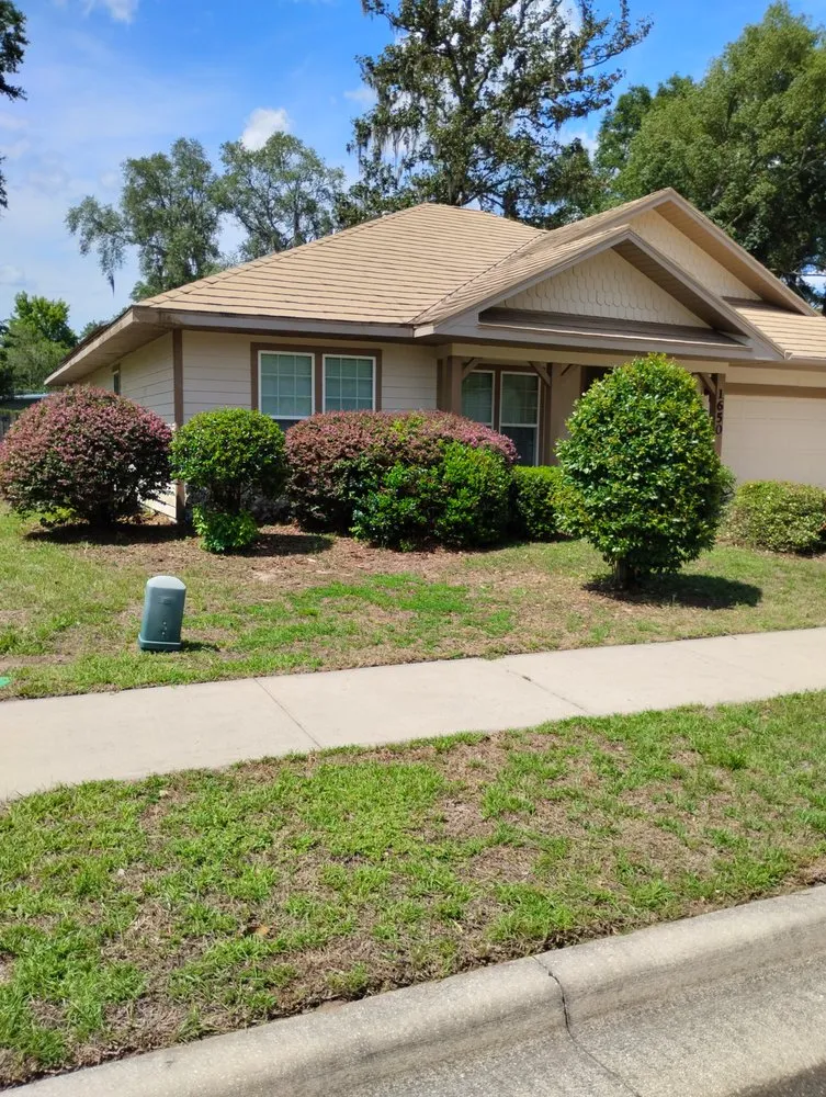 Professional garden landscaping for homes in Gainesville, FL by Worth Every Penny Lawn Care Service