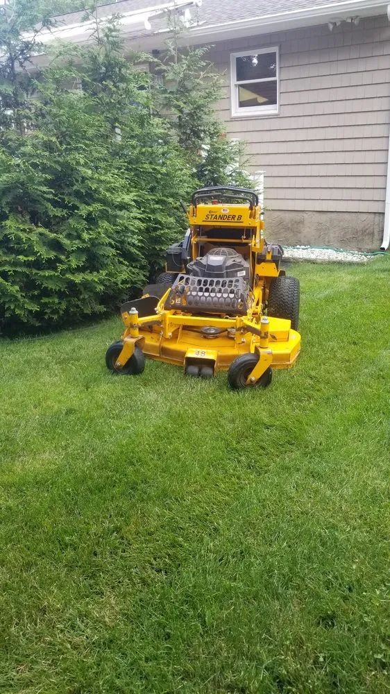 Affordable lawn mowing service for residential properties in Kingston, NY by WQ Home Improvement Construction & Garde